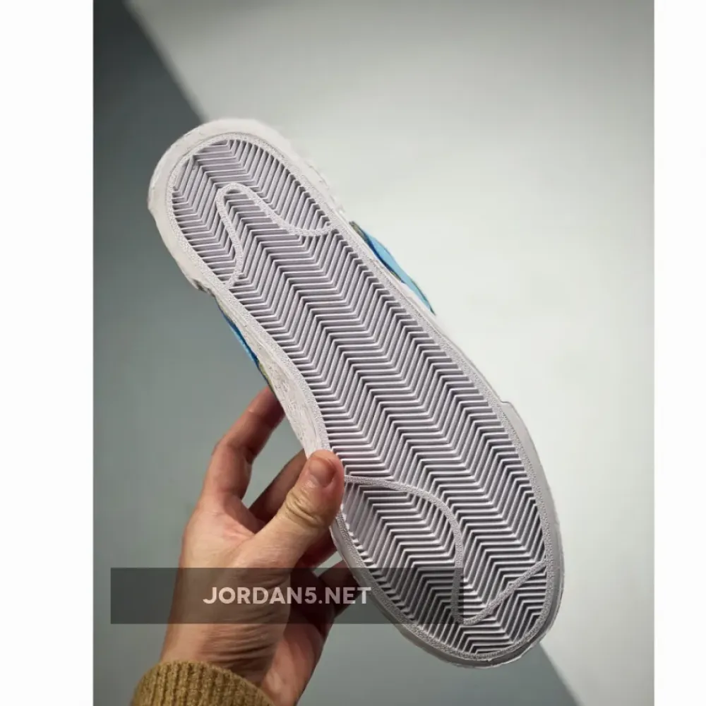 Kaws x Sacai x Nike Blazer Low Blue/Light Blue/Pink/Yellow DM7901-400