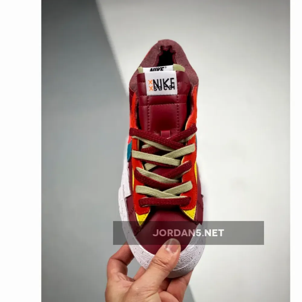 Kaws x Sacai x Nike Blazer Low Team Red/Orange/Pink/Blue DM7901-600